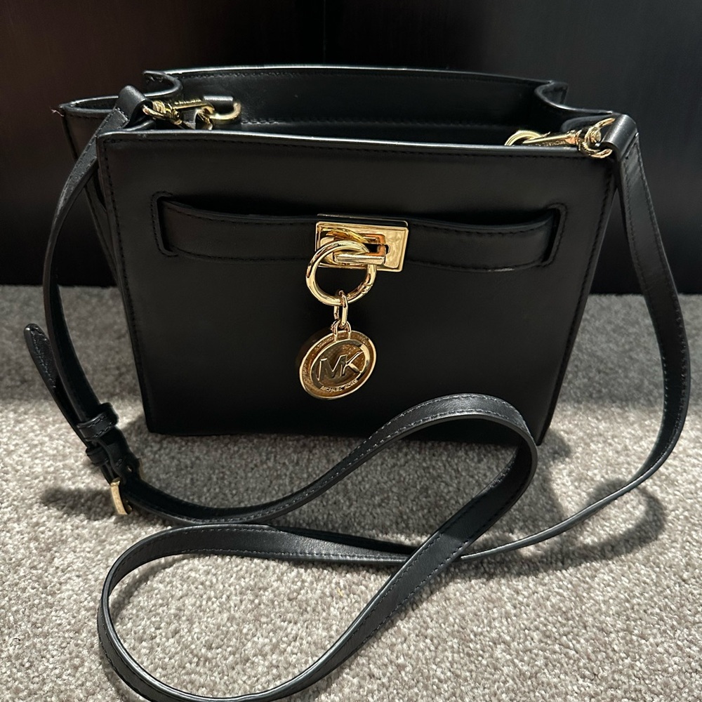 Michael Kors Black and Gold Crossbody Bag with Structured Design